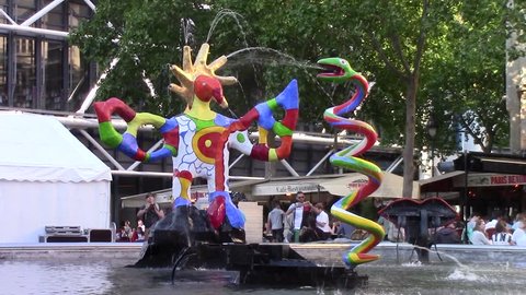 PARIS, FRANCE - JUNE 6, 2015: Stravinsky Fountain (1983) is a fountain with 16 works of sculpture, moving and spraying water, representing works of composer Igor Stravinsky. Place Stravinsky, Paris.