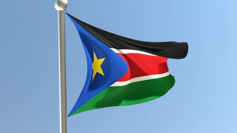 South Sudanese flag on flagpole. South Sudan flag fluttering in the wind.