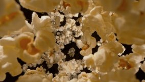 Super Slow Motion Shot of Fresh Fluffy Popcorn Flying Towards the Camera at 1000fps. - Powered by Shutterstock - Get 15% off with code: PIKWIZARD15