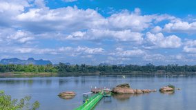
A bridge leading to the Buddha's Footprint in the middle of the Mekong River in Tha Uthen District, Nakhon Phanom Province, Thailand.