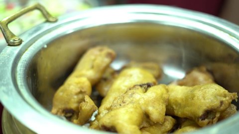 A Bengali butter fish fry, is usually a fish or meat fillet, well spiced coated with bread crumbs and fried.