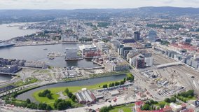 Inscription on video. Oslo, Norway. City center from the air. Embankment Oslo Fjord. Oslo Opera. Text furry, Aerial View