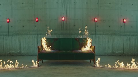 An old sofa burns in the abandoned place . The furniture is on fire . Fire starts to growing on coach or armchair . Flames Igniting And Burning  . Concrete wall background with alert red lights 