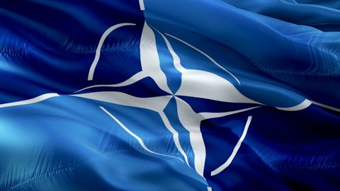 NATO flag. Sign of Military Alliance NATO army seamless animation. 3d North Atlantic Alliance flag waving.  Military Alliance Flag Looping Closeup 1080p Full HD 1920X1080 footage -New York,4 May 2021
