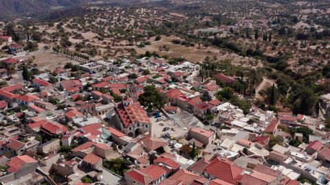 Drone fly over Pano Lefkara in Cyprus, old craft greek village
