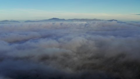 Snowdonia national park drone aerial mountain landscape with cloud inversion weather