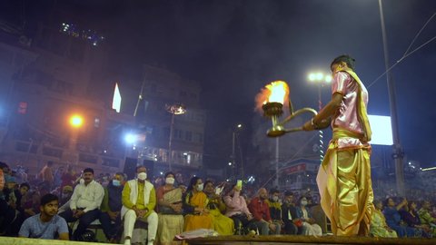 Ganga aarti ceremony rituals were performed by Hindu priests at Dashashwamedh Ghat and Assi Ghat: Varanasi, Uttar Pradesh, India - November 18 2021