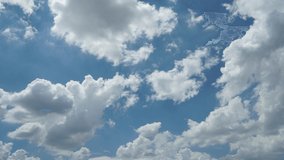 Time lapse motion background blue sky fluffy fluffy white clouds. Clouds and Blue Sky, Video quality, high definition, cumulus clouds and cirrus clouds. cumulus formation, 4k, 3840x2160