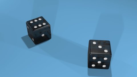 Dice falling on gambling table. Two black plastic cubes show number 9.	