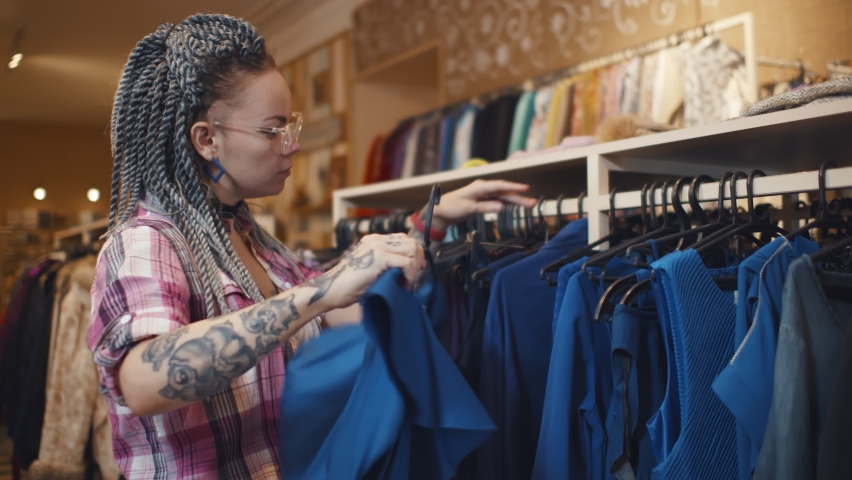 Clothing rack side view Stock Video Footage - 4K and HD Video Clips ...