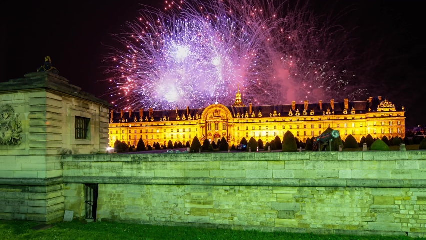 Celebratory colorful fireworks over the Les Invalides (The National Residence of the Invalids) at night. Paris, France | Shutterstock HD Video #1085640395