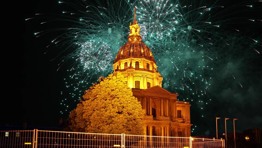 Celebratory colorful fireworks over the Les Invalides (The National Residence of the Invalids) at night. Paris, France | Shutterstock HD Video #1085640401