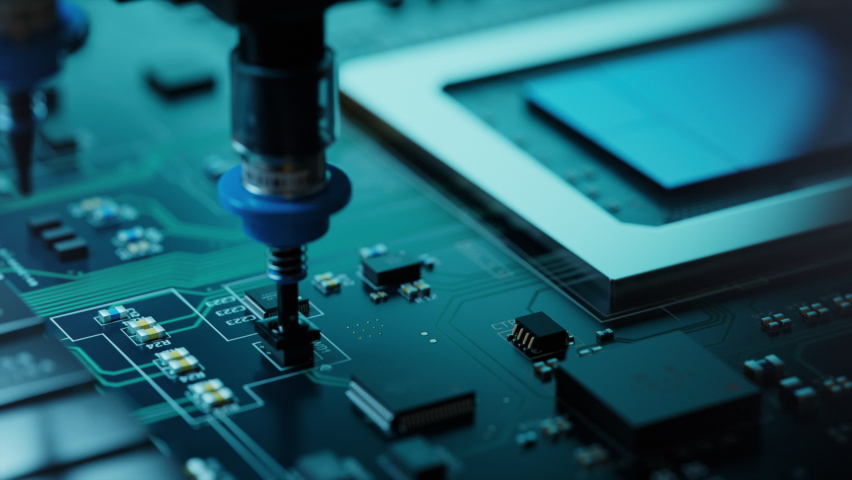 Macro Shot of Automatic Pick and Place machine quickly installs Components on Circuit Board. Electronics and Circuit board Manufacturing Factory. Loopable. Royalty-Free Stock Footage #1085642612