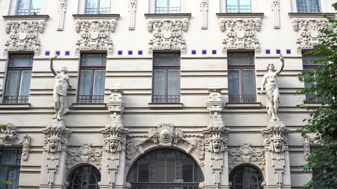 Jugendstil architecture building facade decors. The most known sculptural decors samples on the facade of Art Nouveau house. A house that's located in Riga, Latvia, on Alberta Street.