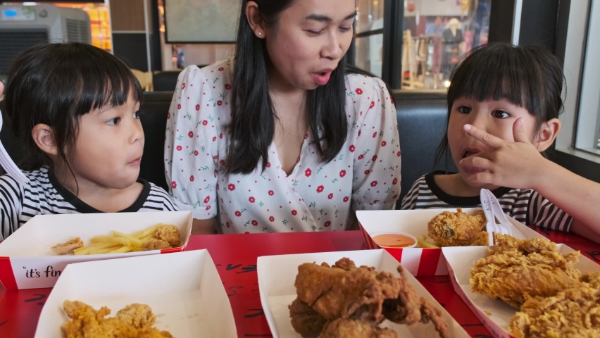 1,033 Family eating fried chicken Stock Video Footage - 4K and HD Video ...