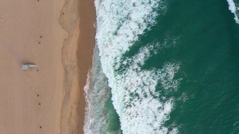 High up aerial shot of Manhattan Beach California USA. Drone shot at midday of Manhattan Beach, sun, sand and sea. Perfect holiday weather