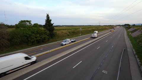 KINTZHEIM, FRANCE - AUGUST 21, 2019: Lanes of A35 autoroute closed for maintenance, cars move at temporary order, wide angle shot at evening hour. Toll free motorway in northeastern France half-closed