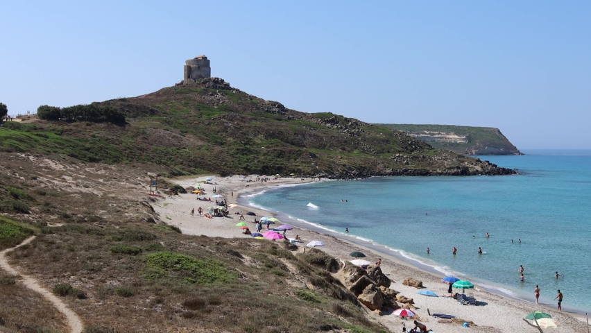 San Giovanni coastal tower and beautifull beach in protected marine area of the Sinis Peninsula, Cabras, Oristano, Sardinia, Italy