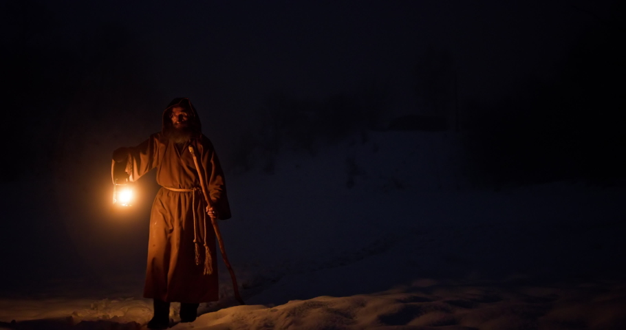 Hermit with lantern walking at night | Shutterstock HD Video #1085677508