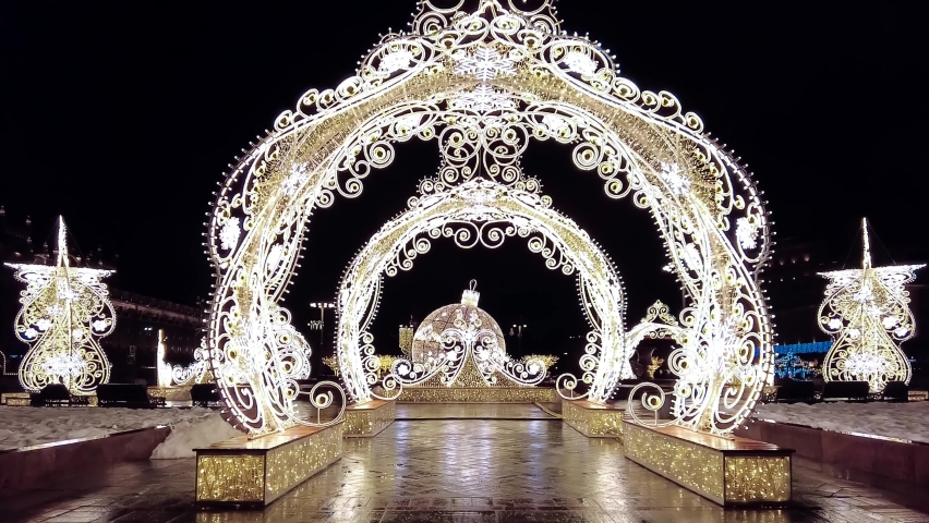 Street decorated for New Year and Christmas. Night winter snow Moscow, Russia, December 19, 2021. 