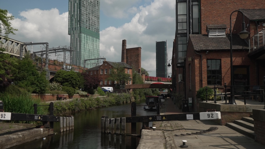 Train passing by and 301 Deansgate in background, Castlefield, Manchester, Lancashire, England, United Kingdom, Europe