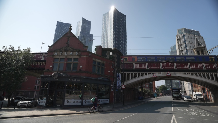 Mainline train and Deansgate Square buildings, Manchester, Lancashire, England, United Kingdom, Europe