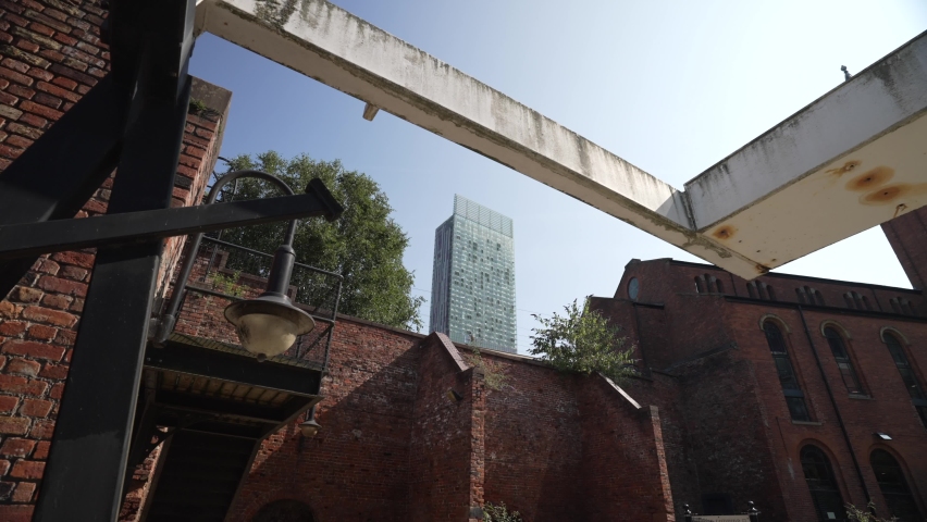 301 Deansgate from historic red brick buildings in Castlefield, Manchester, Lancashire, England, United Kingdom, Europe