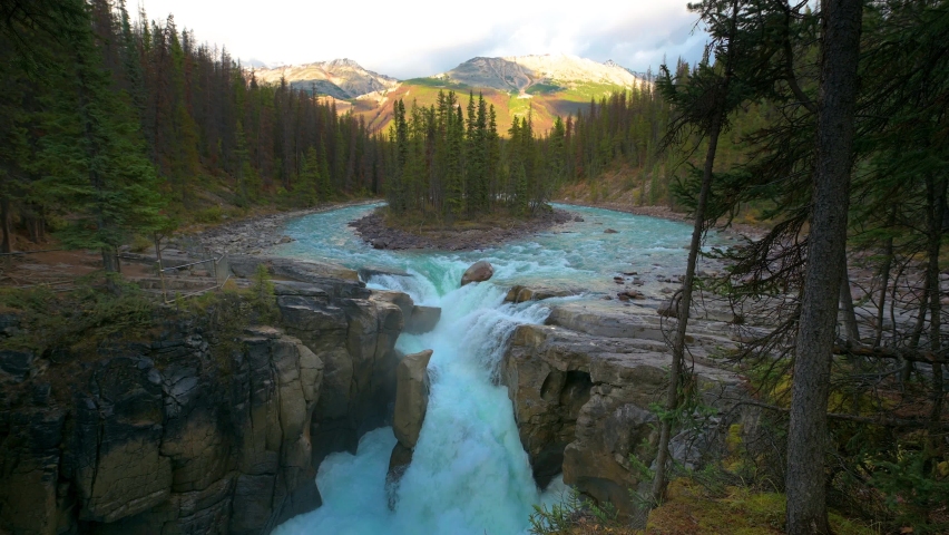 Upper Sunwapta Falls in Jasper National Park, Canada. This waterfall is located on the Sunwapta River and its water originates from the Athabasca Glacier. 4K UHD video.