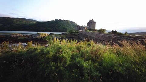 Eilean Donan Castle on Loch Duich at sunset, Dornie, Western Highlands, Scotland, United Kingdom. 19th of July 2021