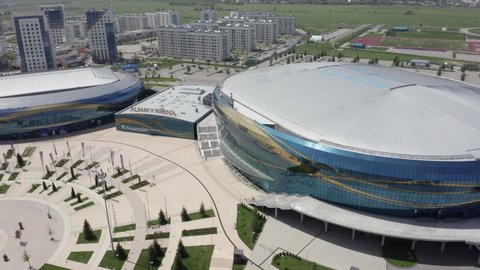 Almaty, Kazakhstan - May 6, 2020: Flight over Almaty Arena on a bright sunny summer day. New sports facility in the city of Almaty.