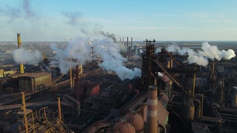 metallurgical plant smoke from chimneys shooting from a drone from a height ecology