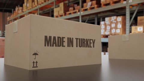 Boxes with MADE IN TURKEY text on conveyor. Turkish goods related loopable 3D animation