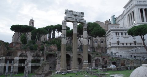 Establishing shot of Imperial Forums on a cloudy day in Rome, Italy. 4k slow motion 50fps