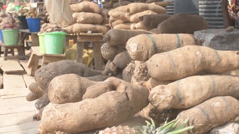 Abuja F.C.T, Nigeria - December 18, 2022: shot of yam for sale in the market.
