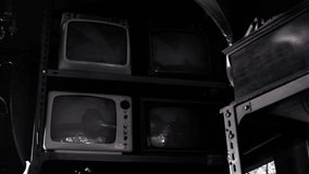 Plasma Balls on Retro Televisions Inside an Antique Shop. Black and White Tone.
