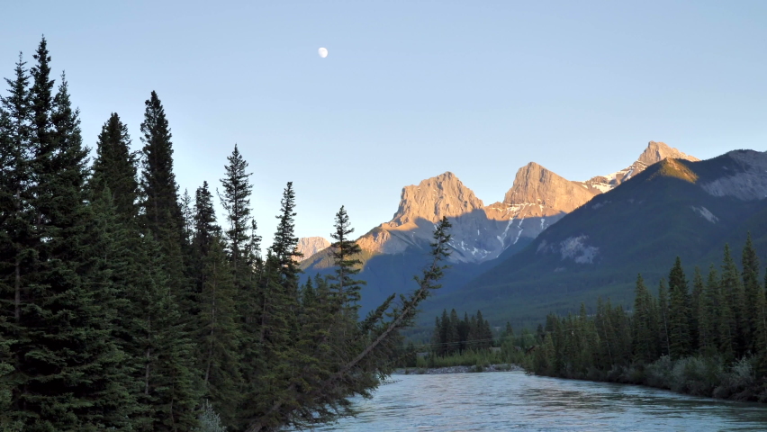 Mountain Sky over Rushing River at Dusk