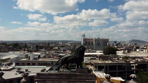 Sunny day, City Center with Arch Monument and Church, León Guanajuato México