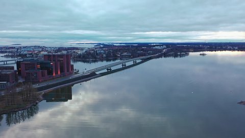 Helsinki , Finland - 12 06 2021: Aerial drone view towards the road 51 and the Lauttasaari district, cloudy fall day, in Helsinki