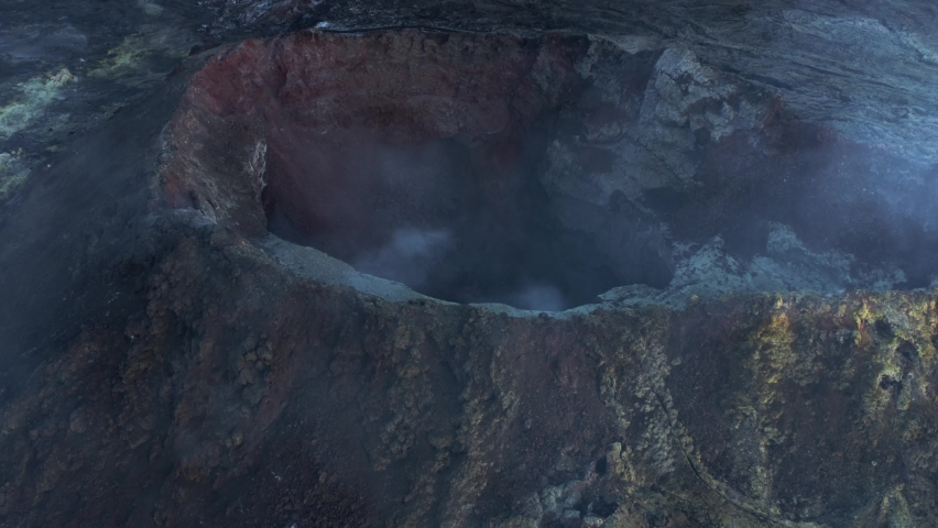 Geldingadalsgos crater with smoke rising from vents, dormant volcano in Iceland