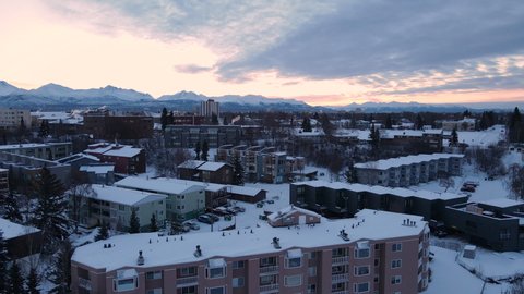 Anchorage alaska in the Winter as sun rises over the downtown buildings. High quality 4k footage