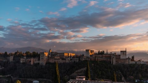 Sunset Timelapse from day to night of Alhambra Palace in Granada, Andalusia, Spain