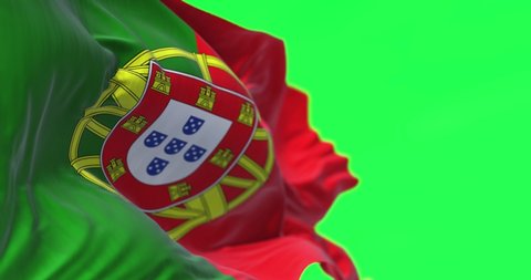 Detail of the national flag of Portugal waving in the wind isolated on green screen. Democracy and politics. European country. Selective focus. Chroma key. Looping Slow motion