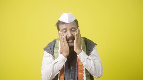 worried senior indian politician lost in by pole election - concept of end of political career, bankrupt and feeling threaten.