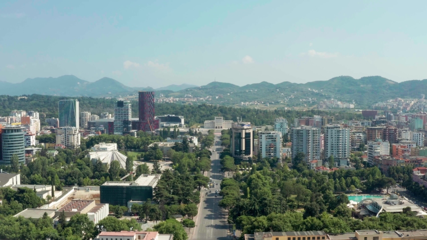 Albania TIRANA Skyline - Drone Flight  Scyscrapers meets Socialistic Architecture Balkan Aerial View Mountins panorama