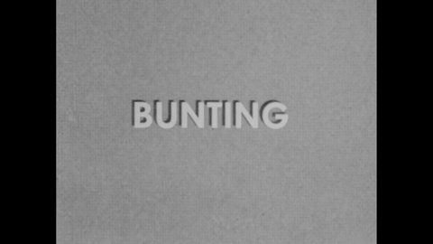 1940s: Intertitle. High angle of baseball player at bat, player bunts, catcher throws ball. Player at bat bunts, catcher throws ball. Player swings bat, stops in bunt position.