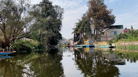 shot of abandoned houses and island in Xochimilco