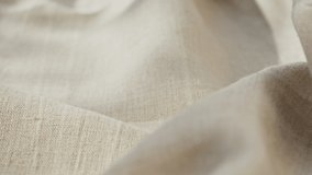 Beige fabric close-up, light brown cloth texture background. Macro shooting of cotton textile.  - Powered by Shutterstock - Get 15% off with code: PIKWIZARD15