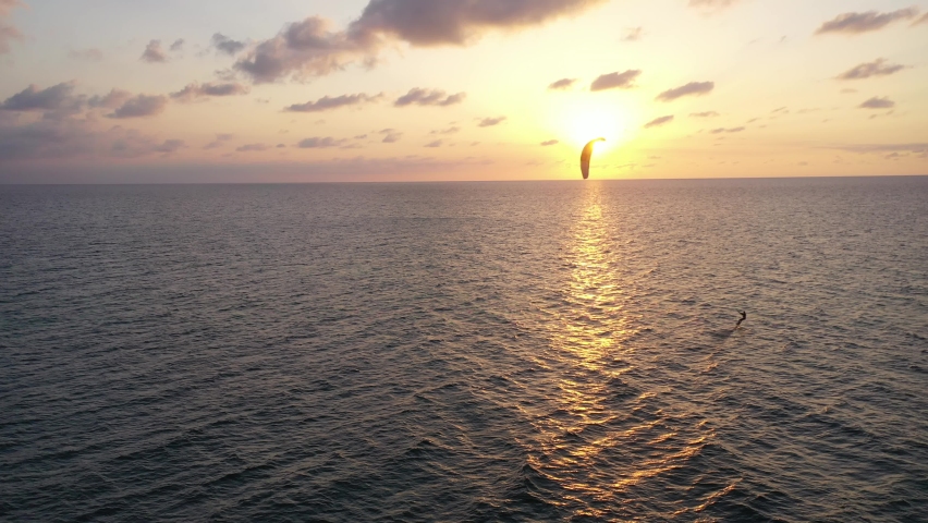 Kite foil surfer on sunset | Shutterstock HD Video #1085771177