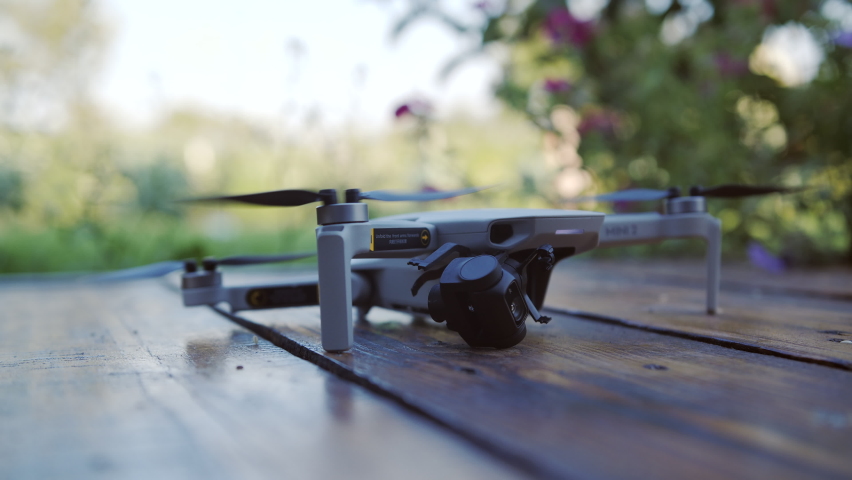 Landing of a damaged drone on wooden board | Shutterstock HD Video #1085771843