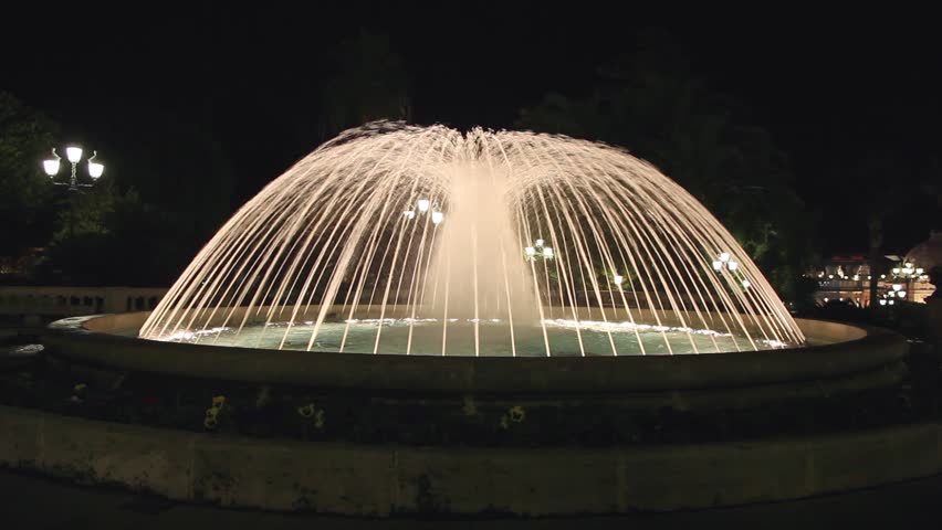 Fountain with lights at night in Monaco